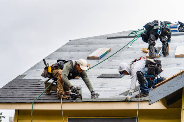 Professional Roofing technician working in Honeoye Falls, NY